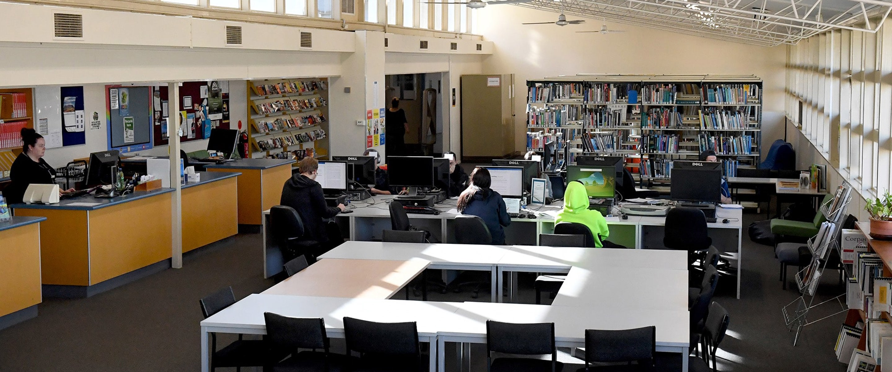 Students working in Melbourne Polytechnic's Heidelberg library