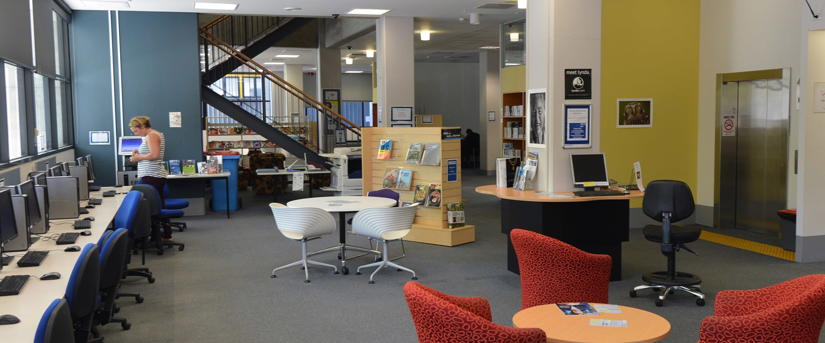 Work stations and meeting tables inside Melbourne Polytechnic's Prahan library
