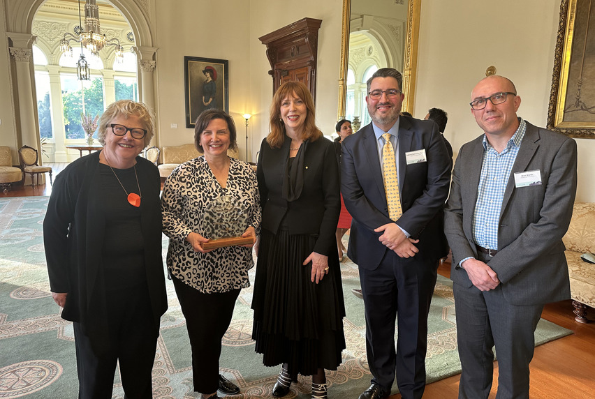 Melbourne Polytechnic's Chief Executive, Frances Coppolillo, holds the International Education and Training Award, alongside Melbourne Polytechnic Executive Directors, Board Chair and Margaret Gardner, AC Governor of Victoria.