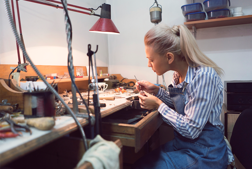 Skilled jewellery maker crafting her pieces